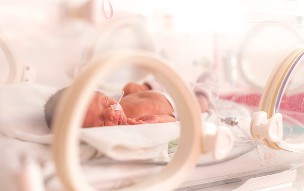 baby in incubator